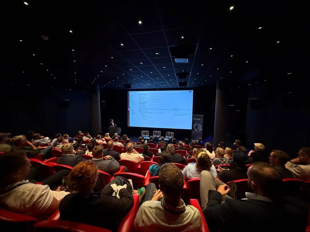 Brandyn speaking to a packed auditorium at Security@